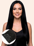 Woman with long black hair wearing a black top, with an inset showing a hair extension.